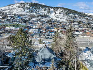 Snowy aerial view with a mountain view