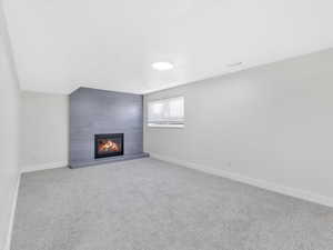 Basement living room with fireplace