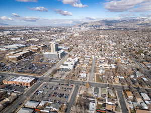 Birds eye view of property with a mountain view