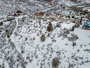 Snowy aerial view with a mountain view