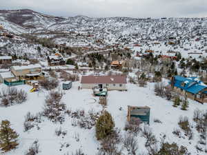 Snowy aerial view with a mountain view