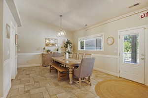 Dining area featuring an inviting chandelier