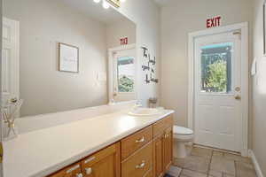 Bathroom with vanity and toilet