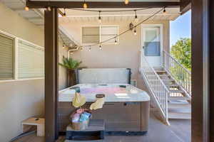 Balcony featuring a hot tub