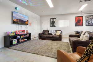 Living room with concrete flooring