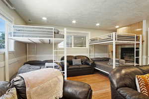 Bedroom with wood-type flooring