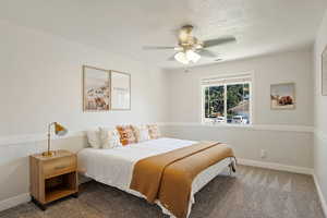 Bedroom with carpet floors and ceiling fan