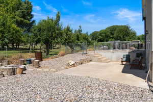 View of patio / terrace with an outdoor fire pit