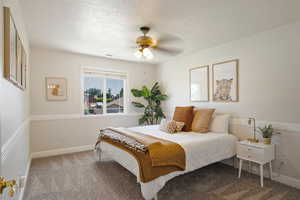 Bedroom with carpet floors and ceiling fan