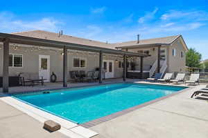 View of pool featuring a patio area