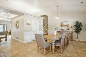 Dining area featuring a notable chandelier