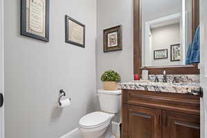 Bathroom with vanity and toilet