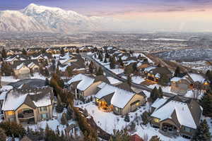 Snowy aerial view featuring a mountain view