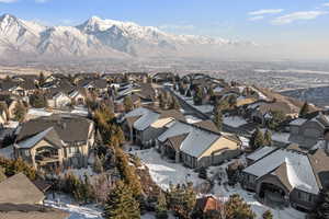 Snowy aerial view with a mountain view