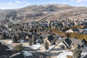 Snowy aerial view with a mountain view