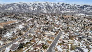 Snowy aerial view with a mountain view