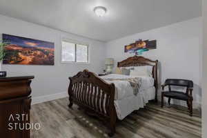 Bedroom featuring hardwood / wood-style flooring