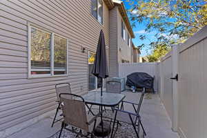 View of patio / terrace with area for grilling and central air condition unit