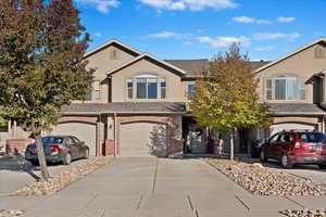 View of front of property featuring a garage