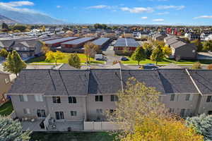 Birds eye view of property with a mountain view