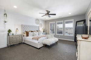 Bedroom featuring recessed lighting, dark carpet, visible vents, a ceiling fan, and baseboards