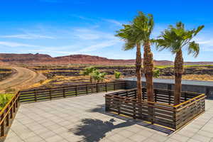 Oasis view from rooftop patio / terrace with a mountain view