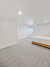 Unfurnished bedroom with carpet floors