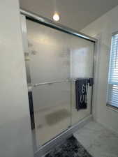 Bathroom featuring walk in shower