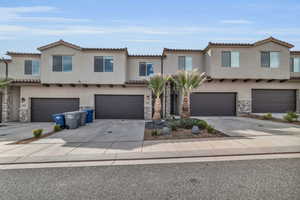 View of front of property featuring a garage