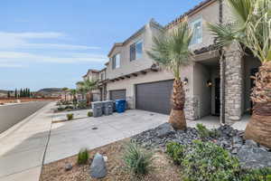 View of front of home featuring a garage