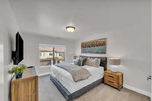 View of carpeted bedroom