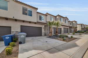 View of front of property featuring a garage