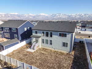 Rear view of house with a mountain view