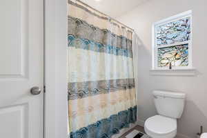 Bathroom with walk in shower and toilet