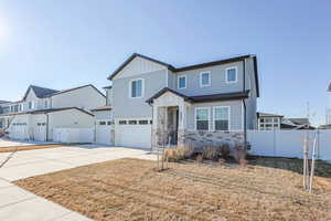 View of front of home featuring a garage