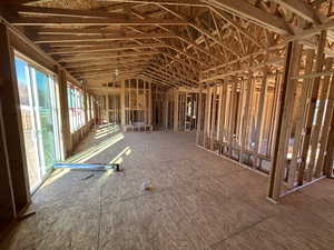 Miscellaneous room featuring vaulted ceiling