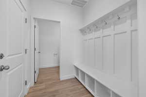 Mudroom featuring light hardwood / wood-style floors