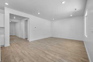 Empty room with light wood-type flooring