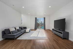 Living room featuring dark hardwood / wood-style flooring