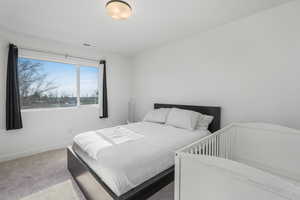 Bedroom featuring carpet flooring