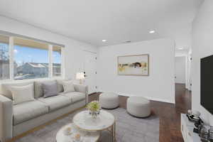 Living room with hardwood / wood-style floors