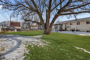 View of yard with a pergola