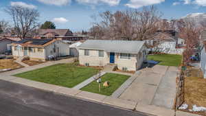 View of front of house featuring a front lawn