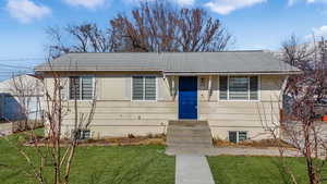 View of front of home with a front lawn