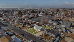 Birds eye view of property with a mountain view