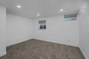 View of carpeted spare room