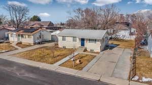 View of front facade with a front yard