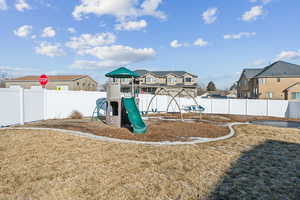 View of jungle gym featuring a yard