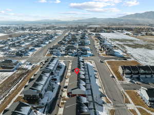 Snowy aerial view with a mountain view