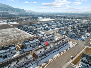 Snowy aerial view with a mountain view